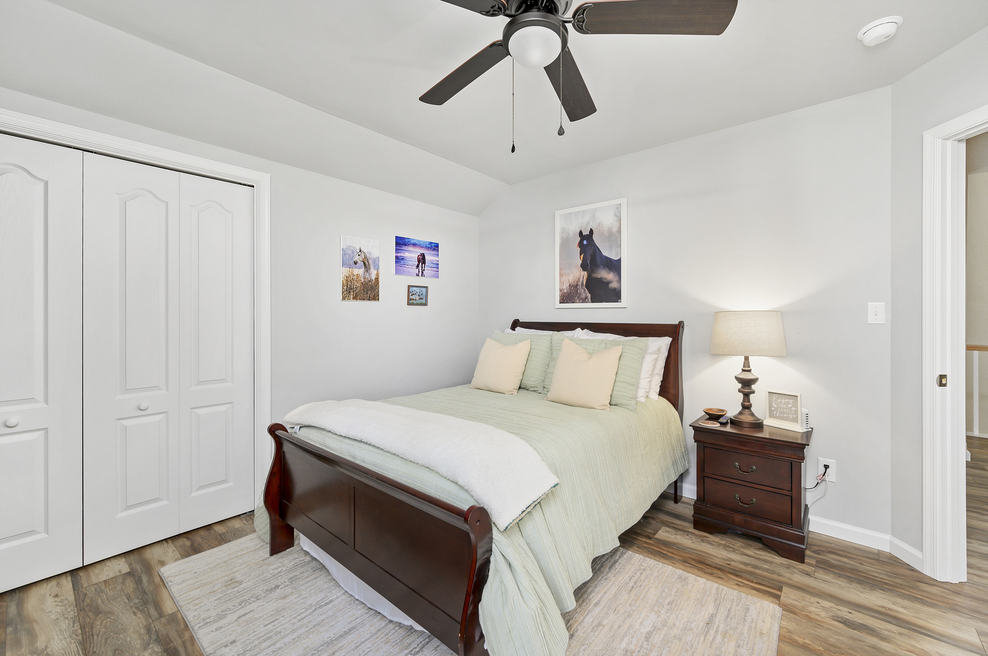 Bedroom 2 has a Full Bed and a tasteful Coastal Flair.