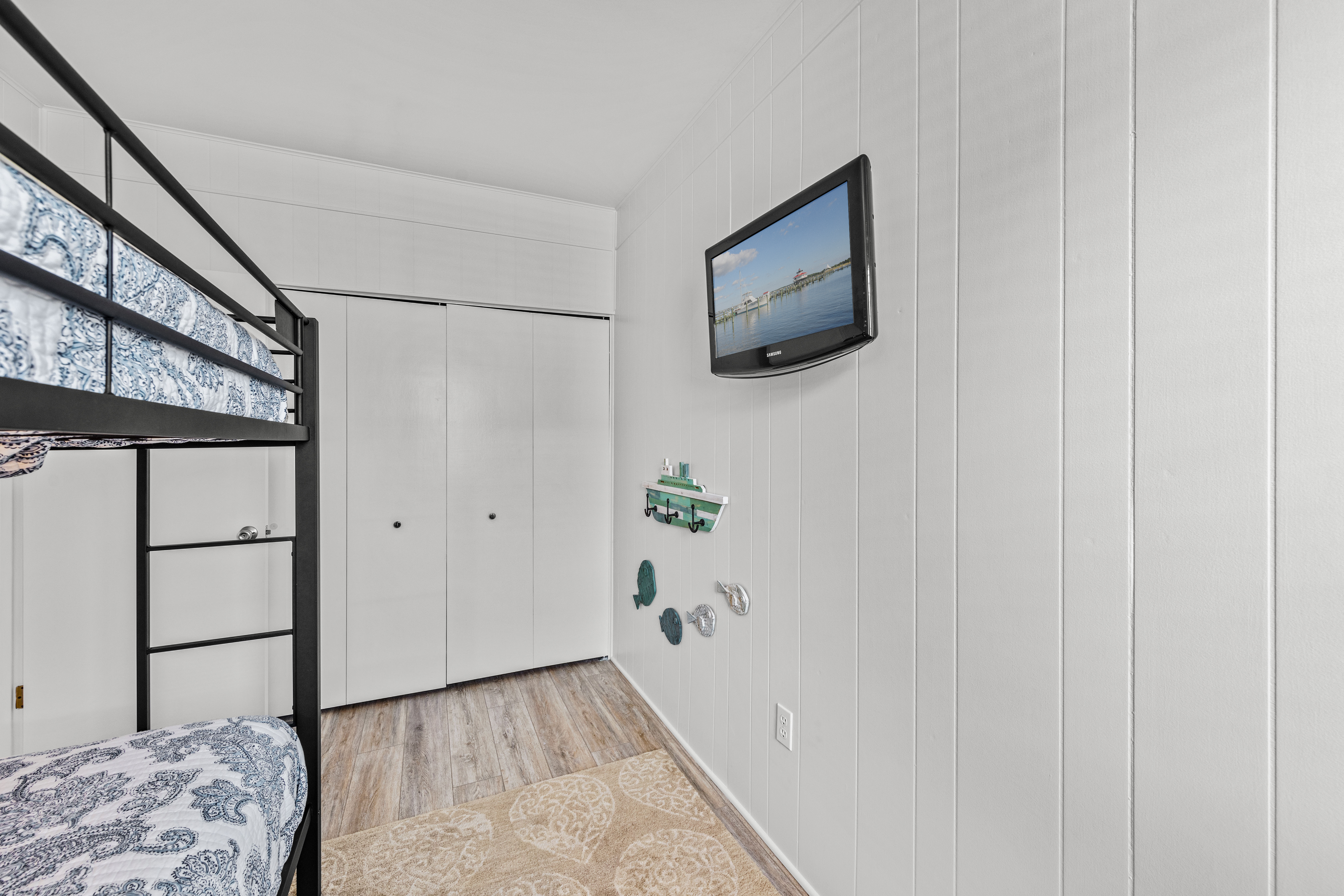 With a Queen Bunk Bed, Bedroom 2 will comfortably sleep up to 4.