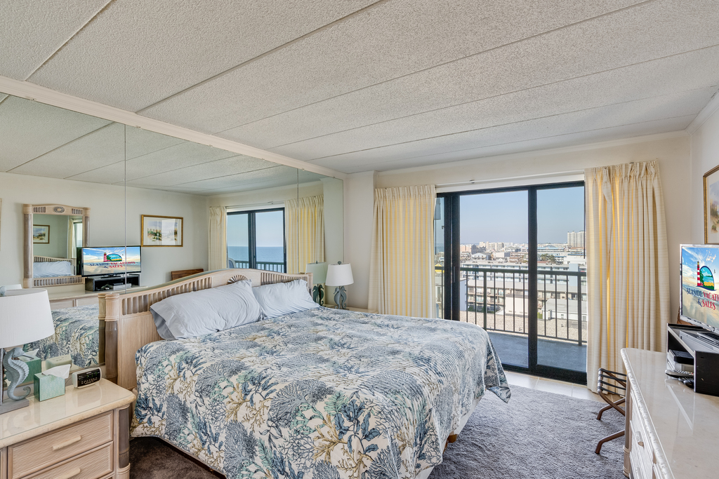 The Primary Bedroom is a Cozy retreat with a King bed and great views