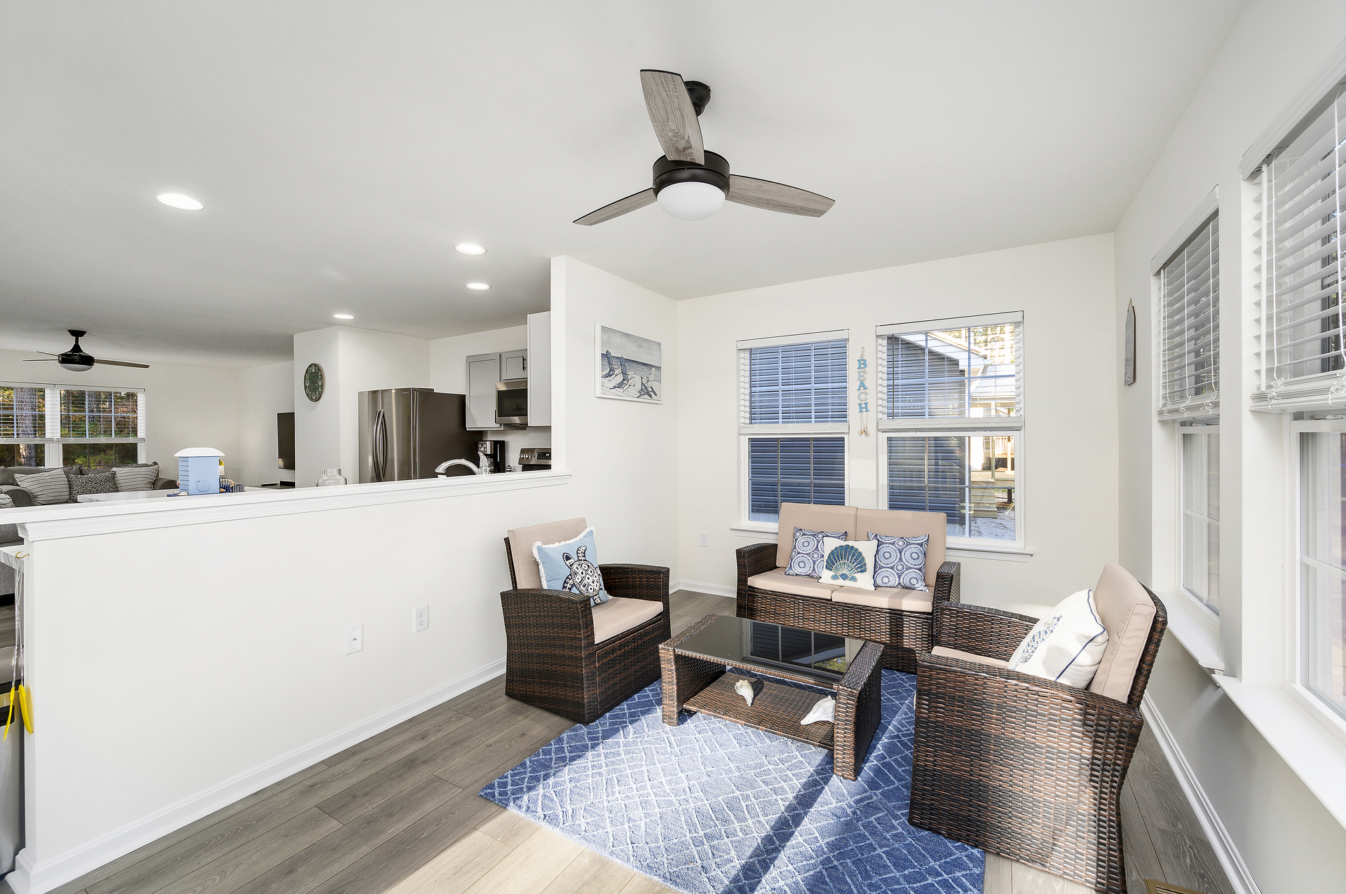 Just off the Kitchen is a comfy Sunroom.