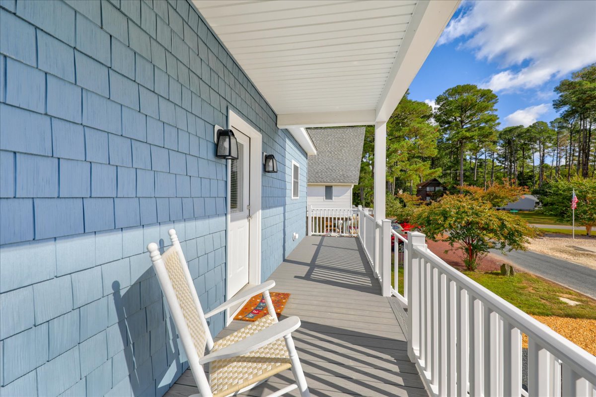The Covered Porch beckons you to sit a spell.....