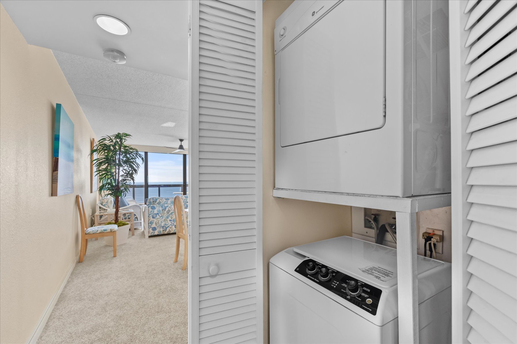 A stacked Washer/Dryer in the hall for your use.