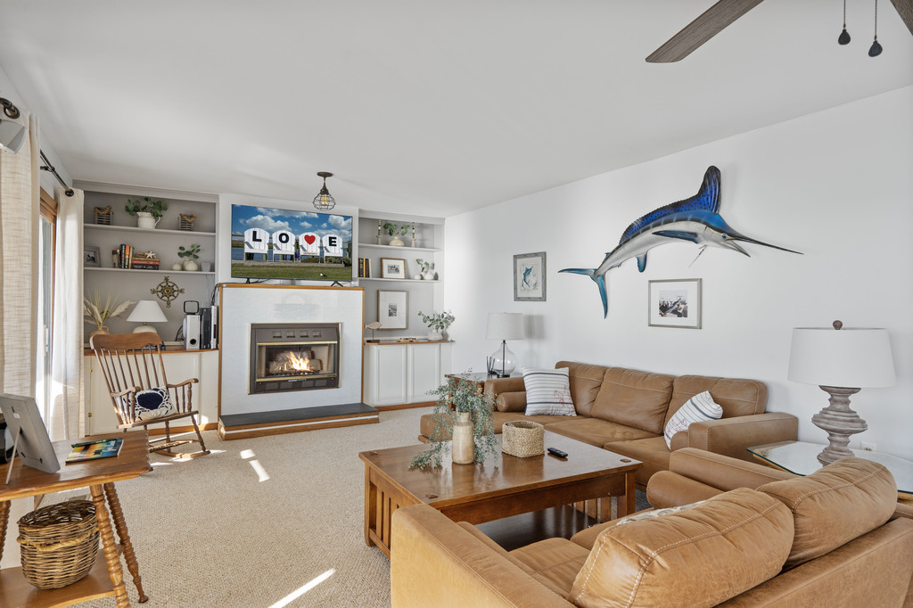 Upstairs, you`ll find a lovely Family Room with views, views, and more views.