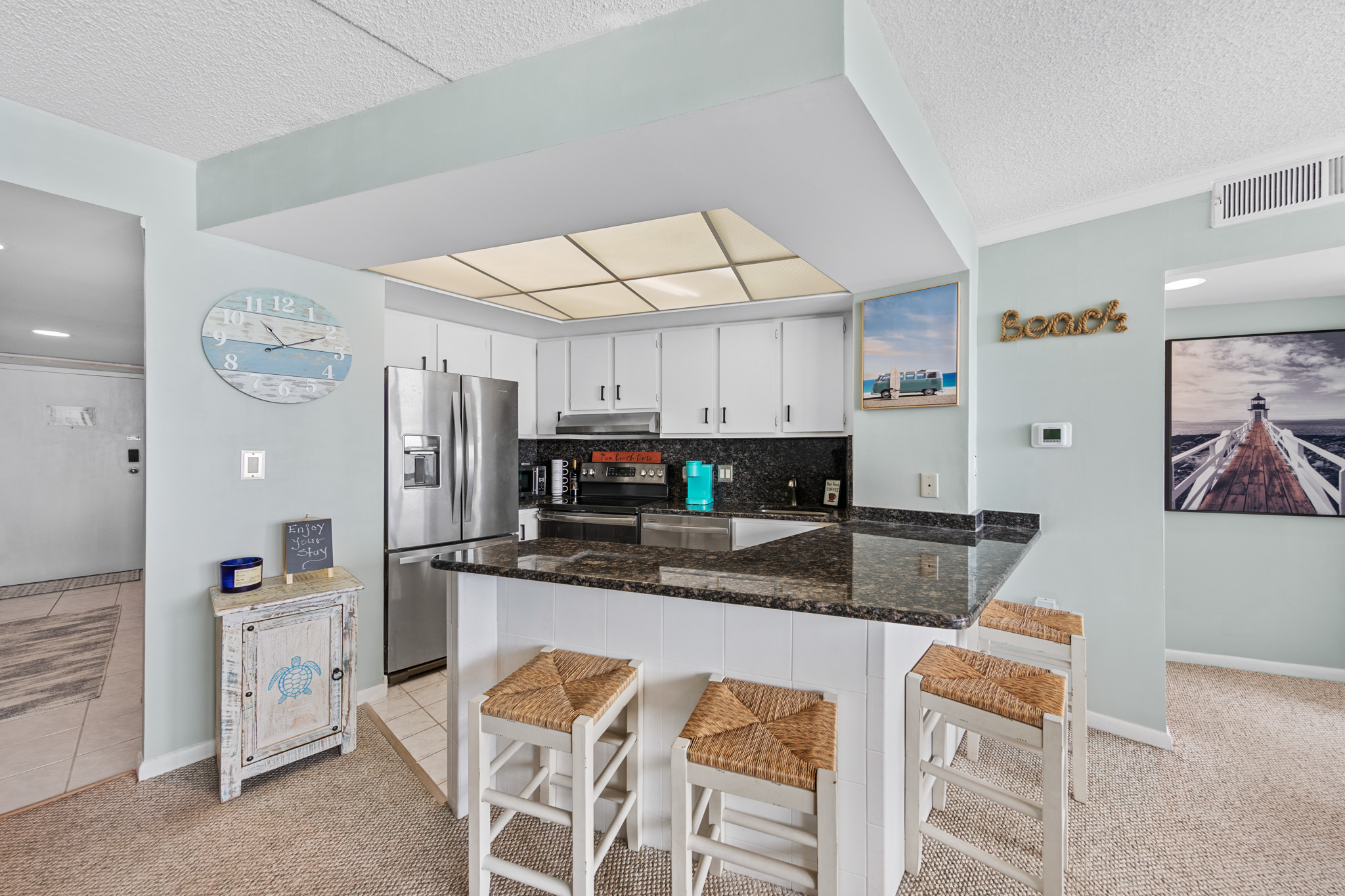 Gleaming granite countertops welcome you to this stunning kitchen!