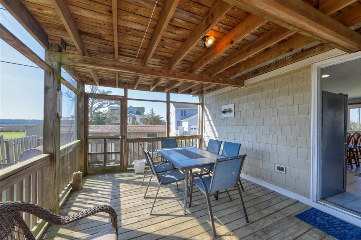 Or dine Al-Fresco on the Water View Screened Porch.