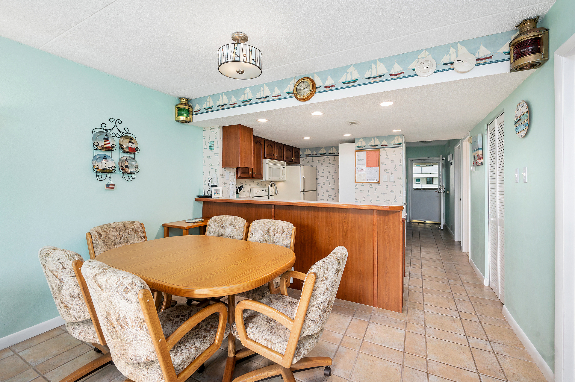 Dining Area opens to gorgeous Well-Stocked Kitchen.