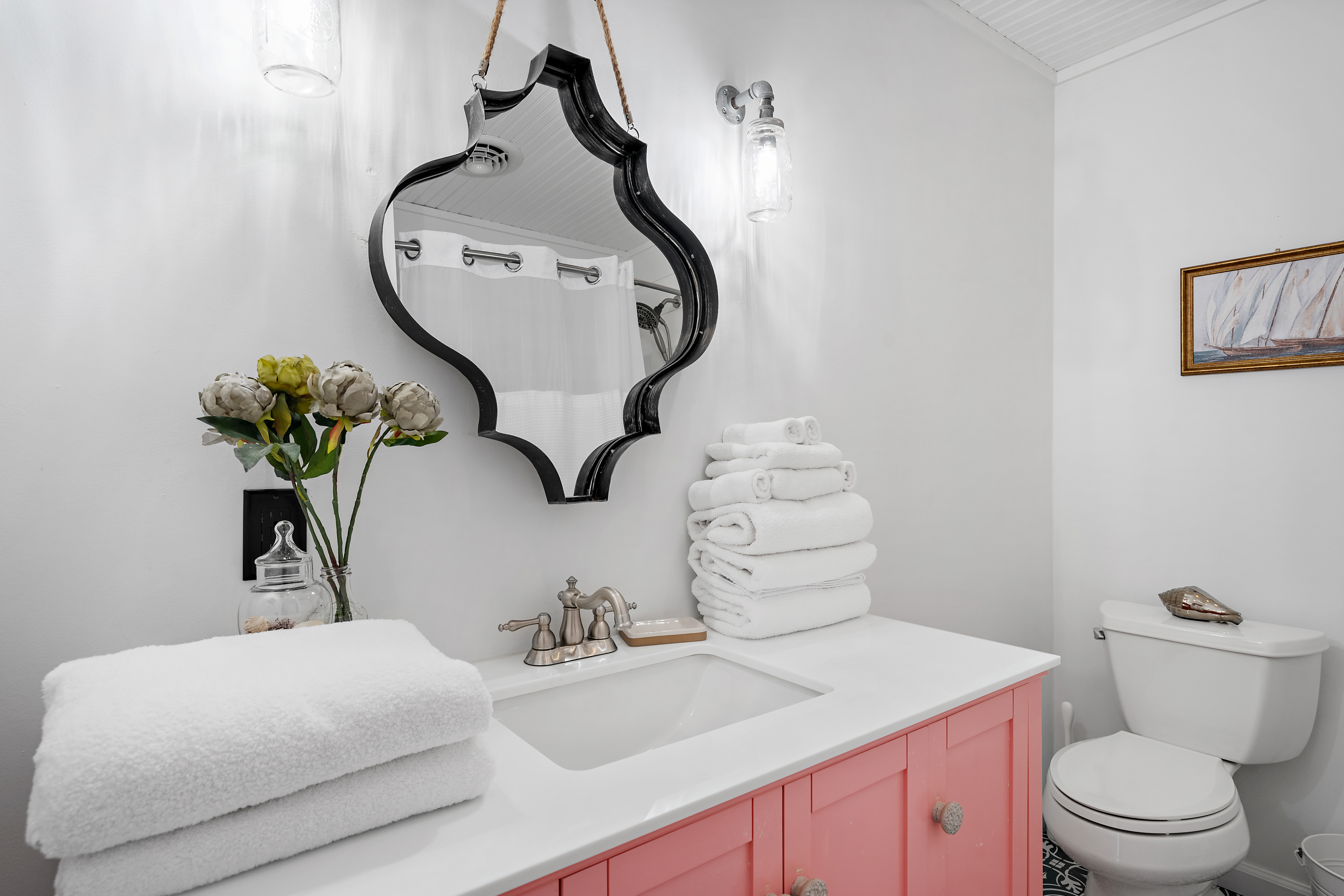 Master Bath has a Coastal Shabby Chic Flair you will love! Linens Included!