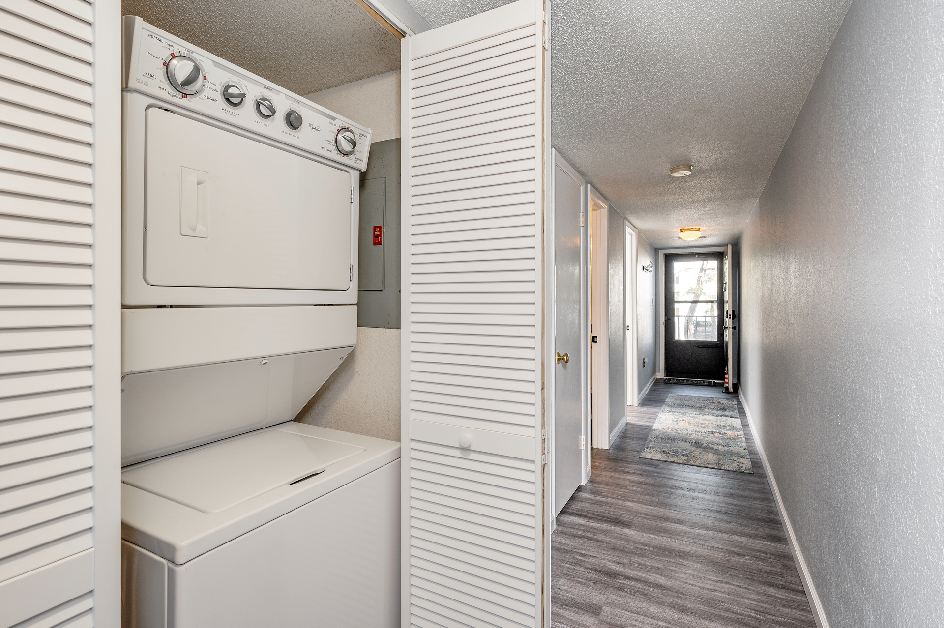 Full size washer and dryer conveniently placed right by the entrance