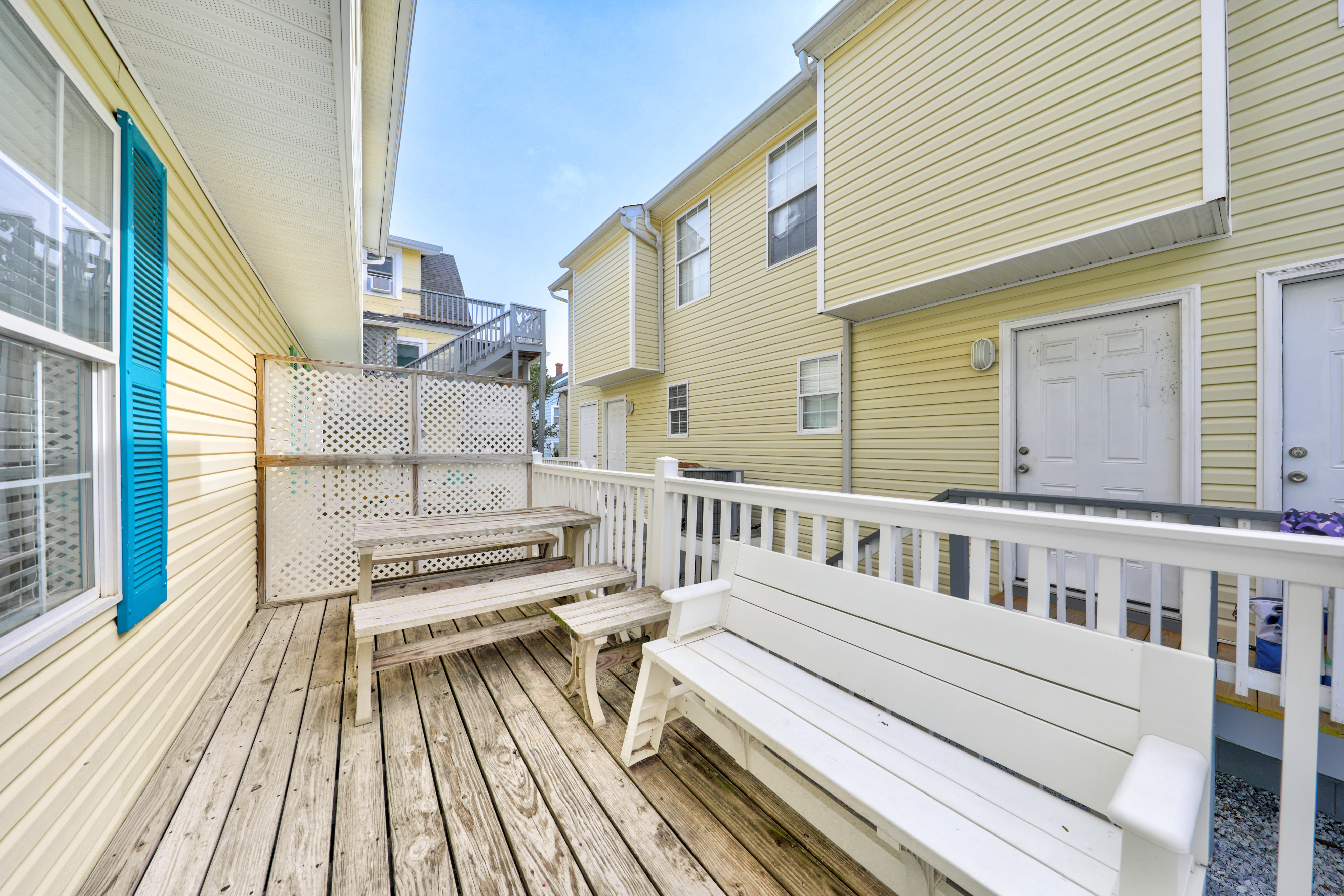 Enjoy lunch on the deck in between trips to the beach.