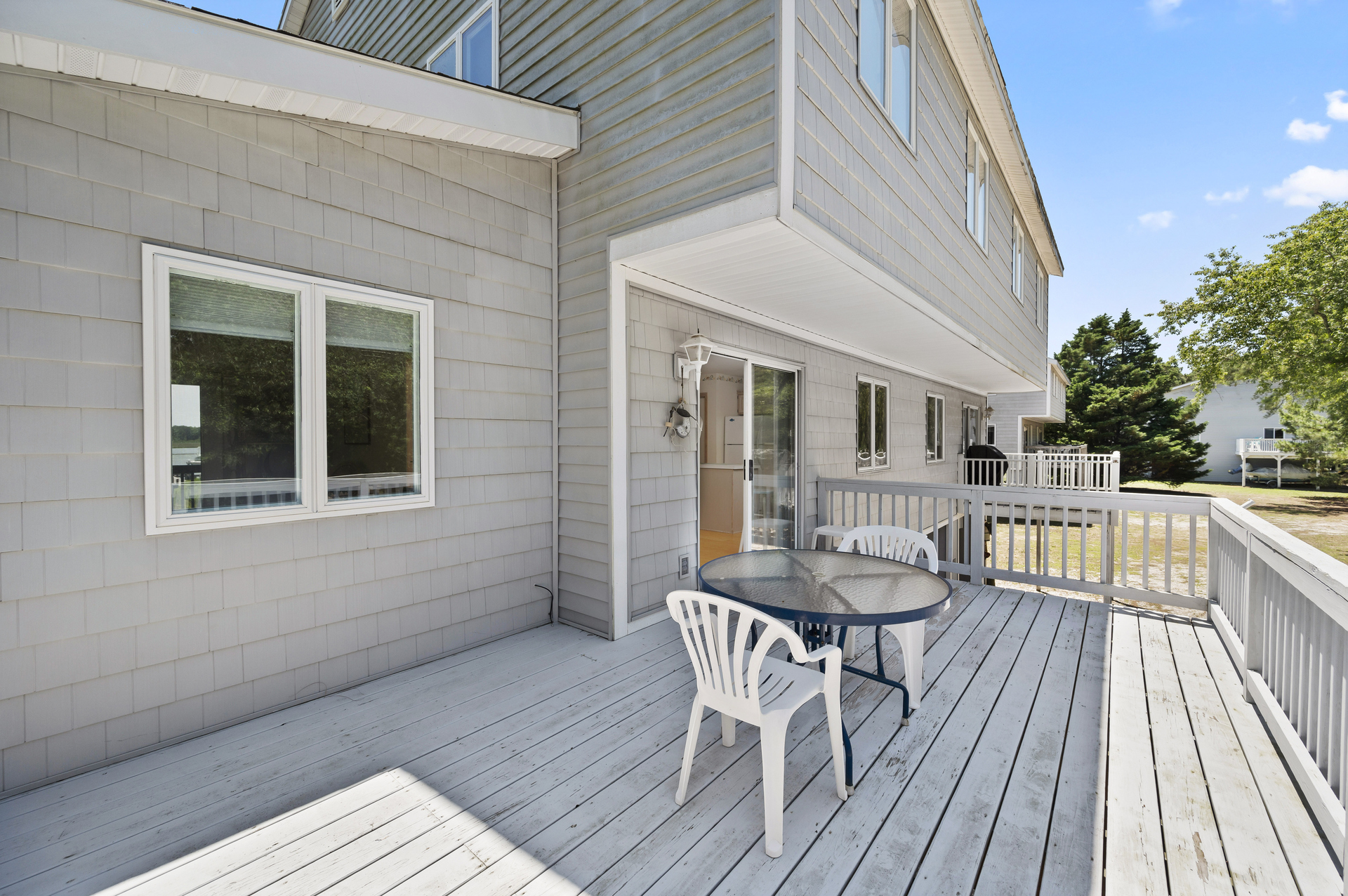 Another Deck off side of home is another great place to dine!