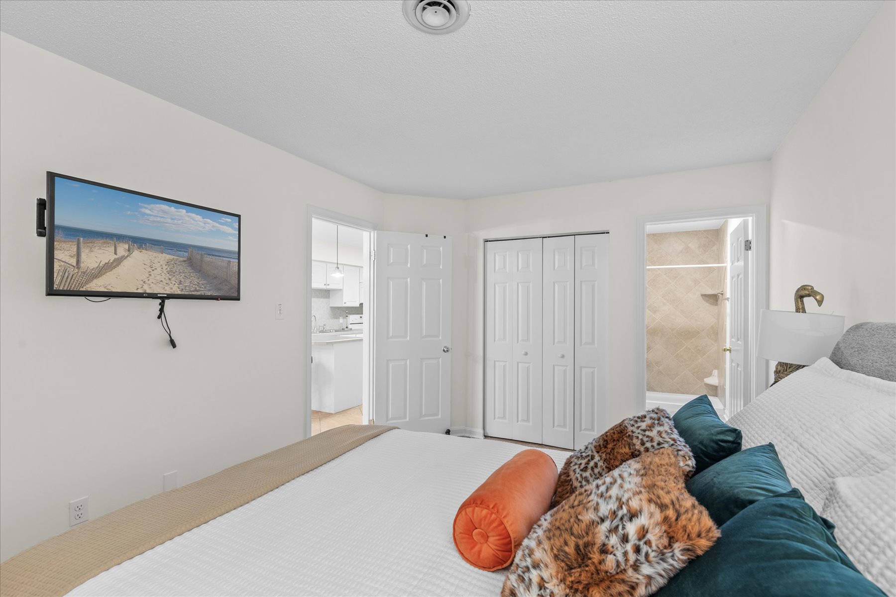 The Primary is located right off the Kitchen.