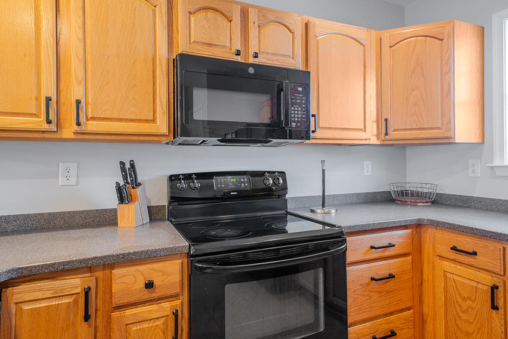The kitchen is equipped with all the major appliances.