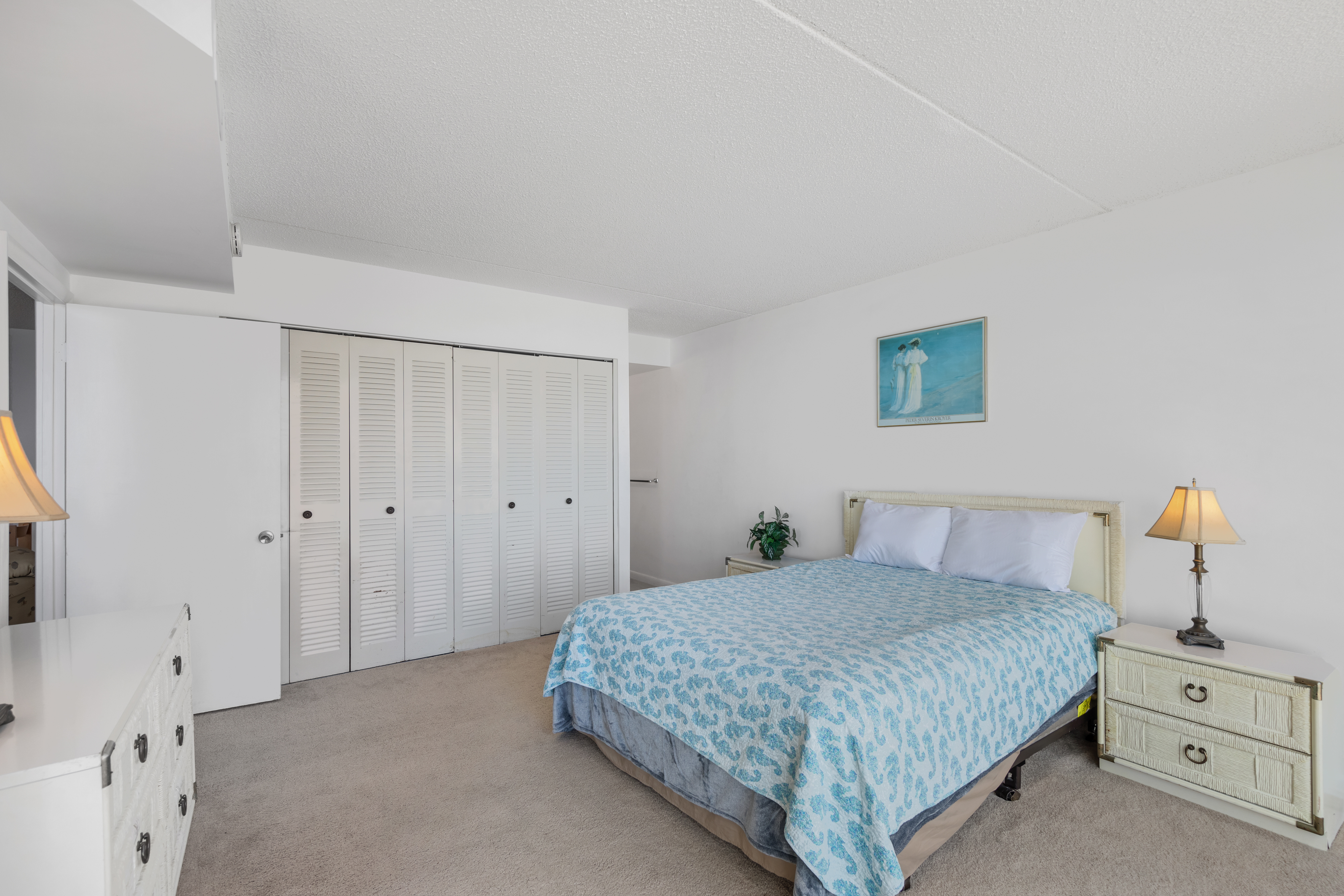 Relax in the Plush Queen Bed in the Primary Bedroom