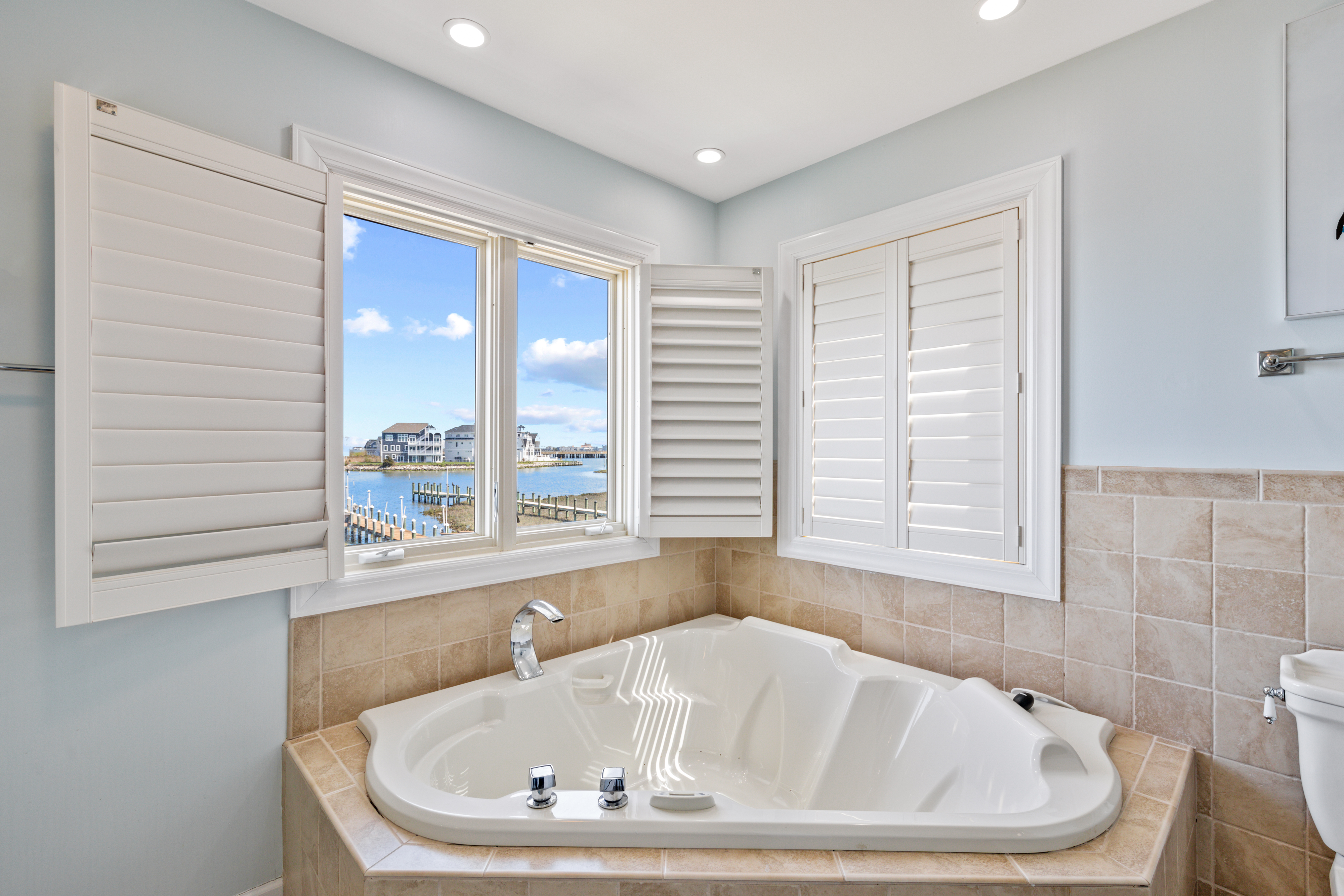 Relax and soak in this beautiful large corner Tub.