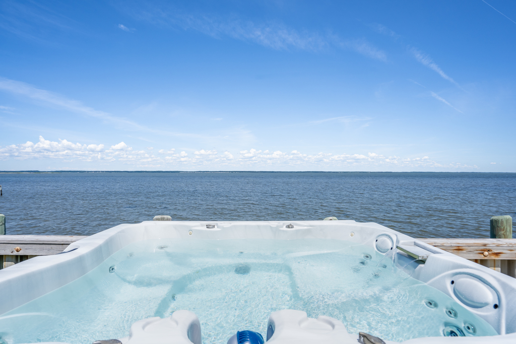 This spectacular home sits directly on the Chincoteague Bay.
