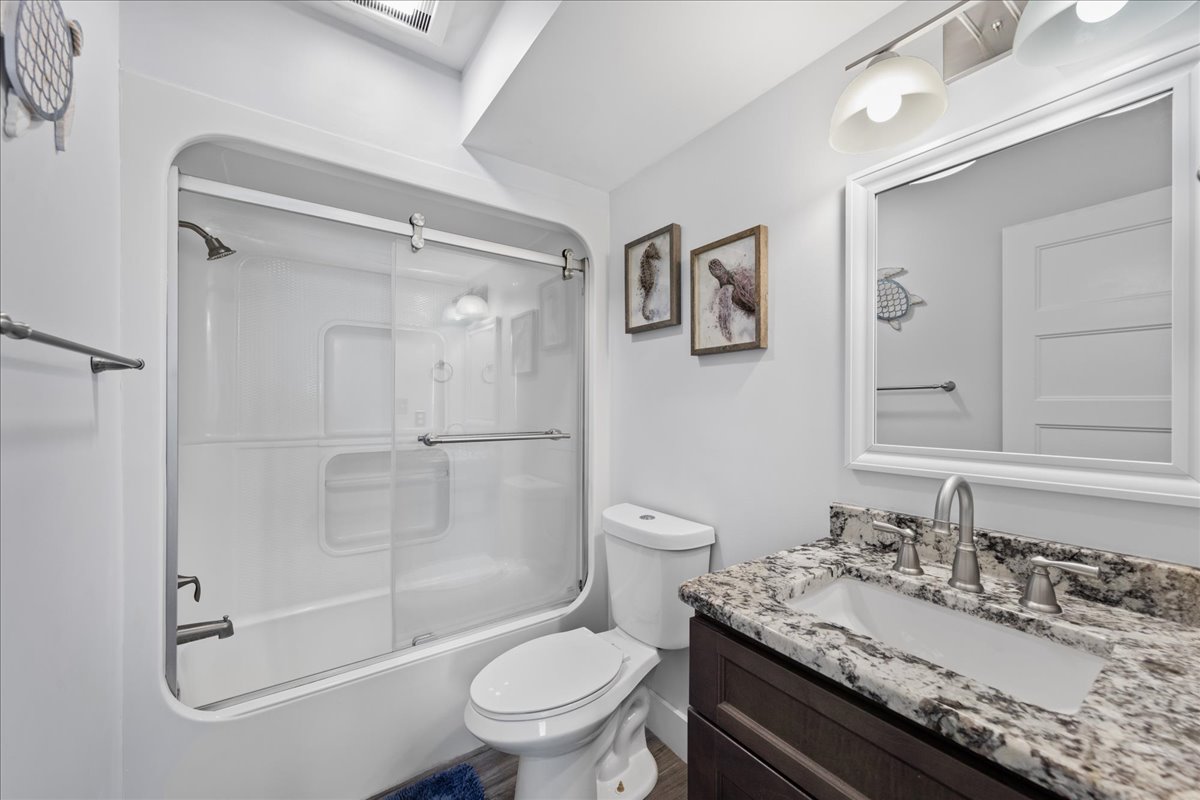 Getting ready for the Day will be an Ocean's Breeze in this Bright attached Bath with Shower/Tub Combo.