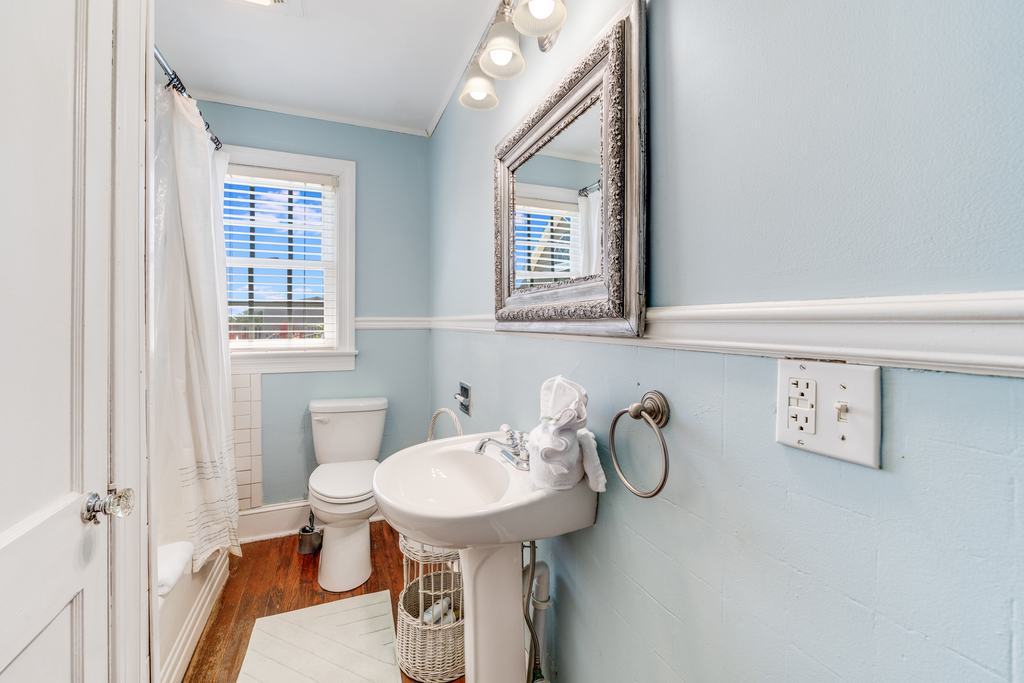 There is a Full Bath with Hardwood Floors on the 1st Floor.