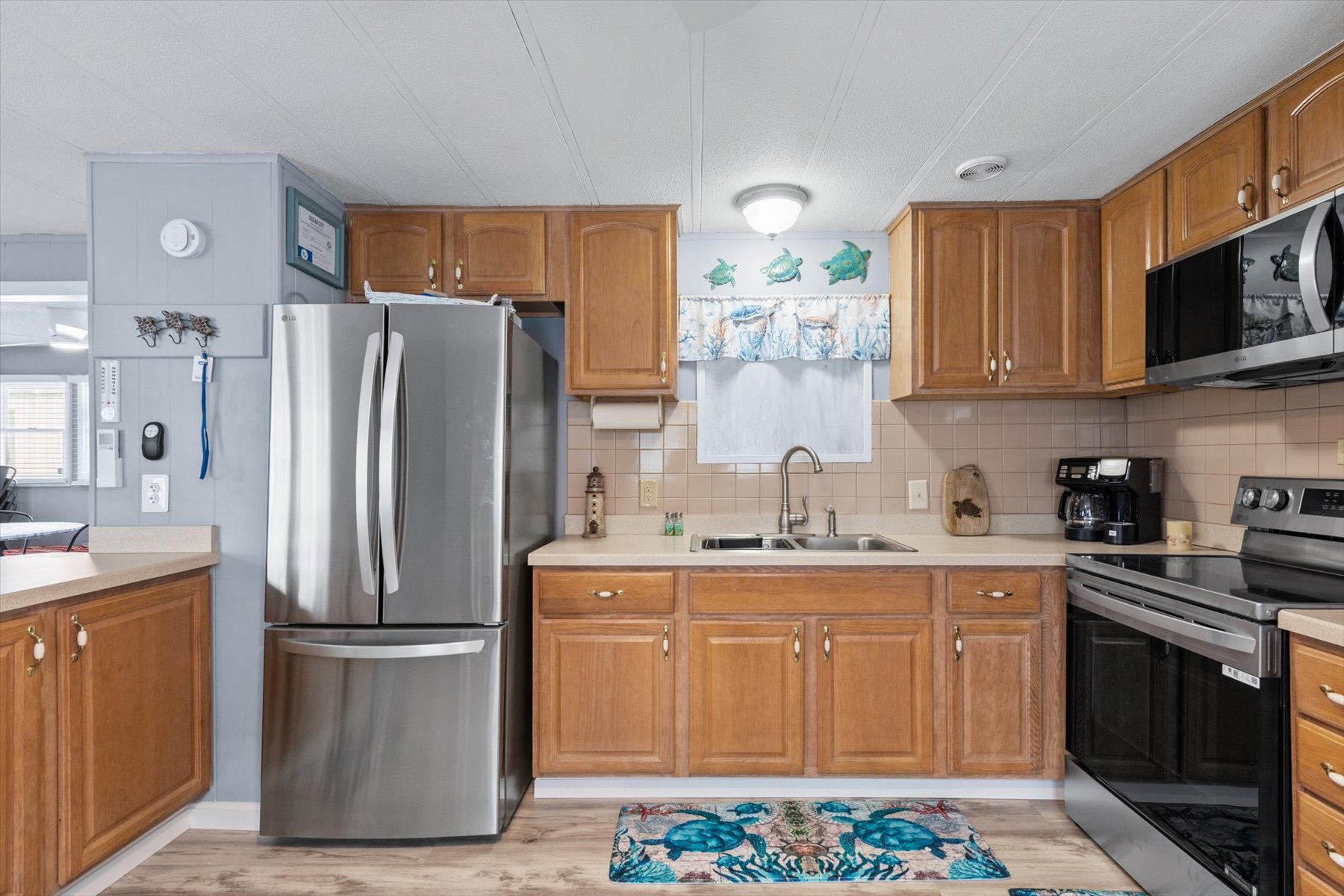 All of the comforts of home are available in the well equipped kitchen