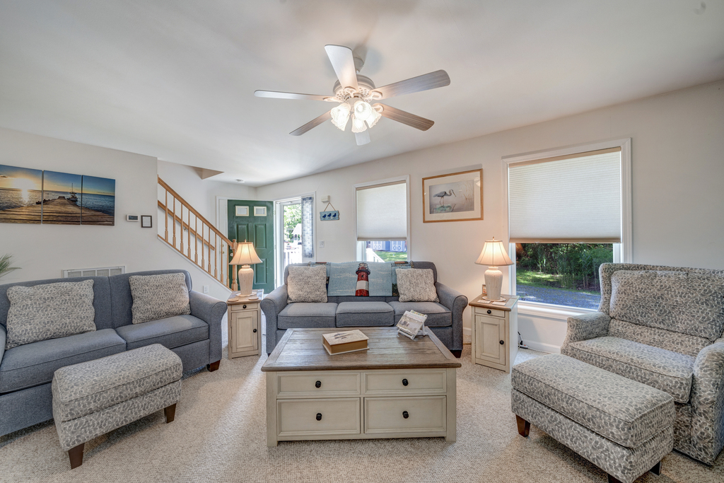 This gorgeous Cape Cod is tucked on quiet street, yet close to everywhere you want to be.