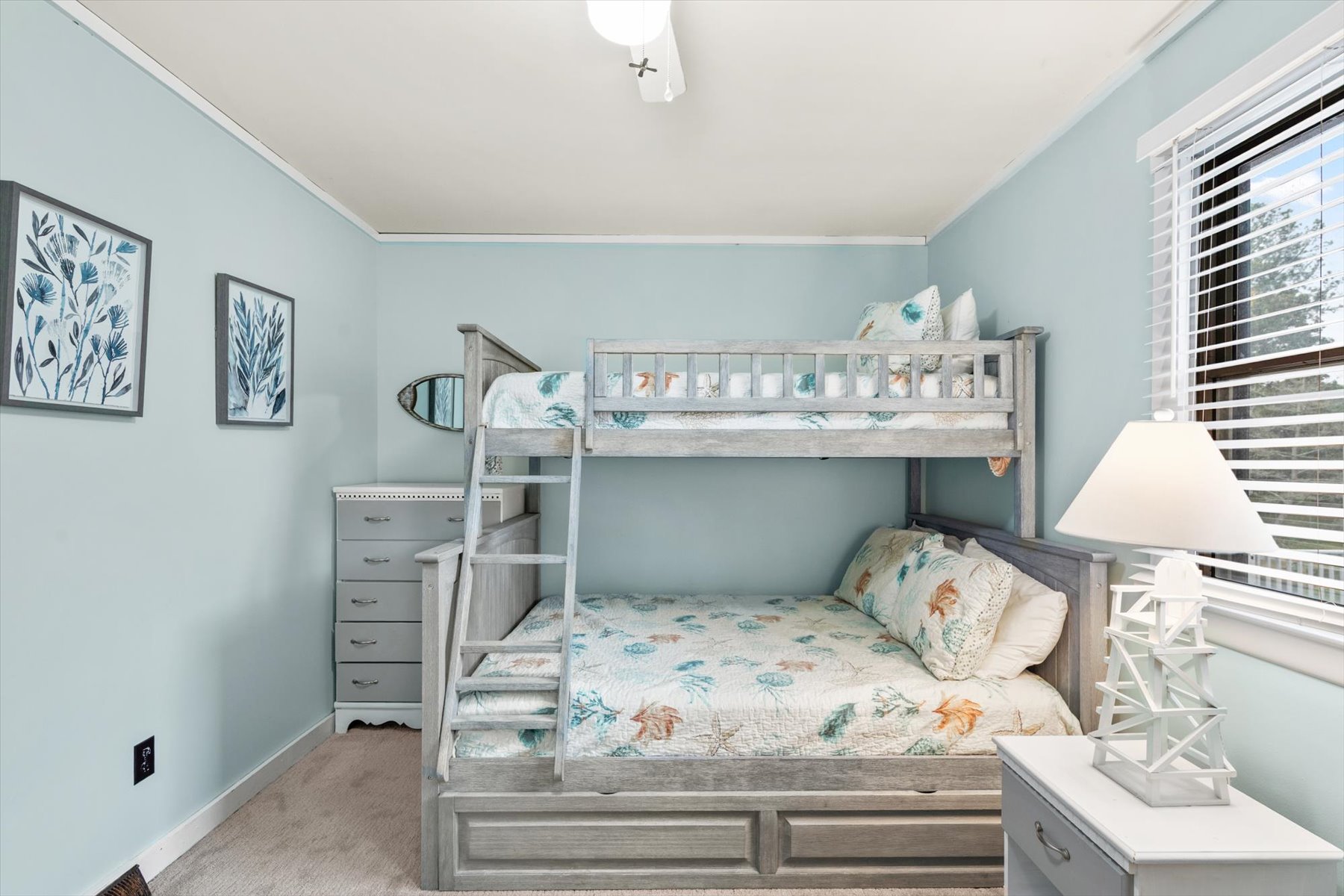 This bedroom offers a Pyramid Bunk, Twin over Full.