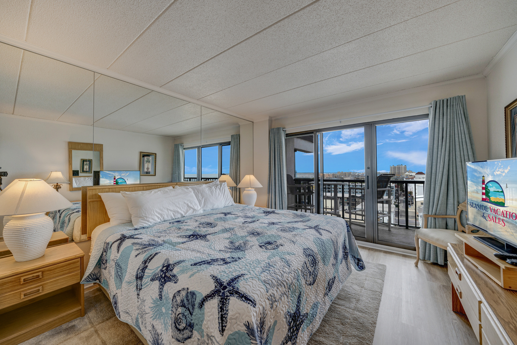 Balcony access from the Primary Bedroom allows you to wake up to the tranquil sounds and breathtaking views of the ocean