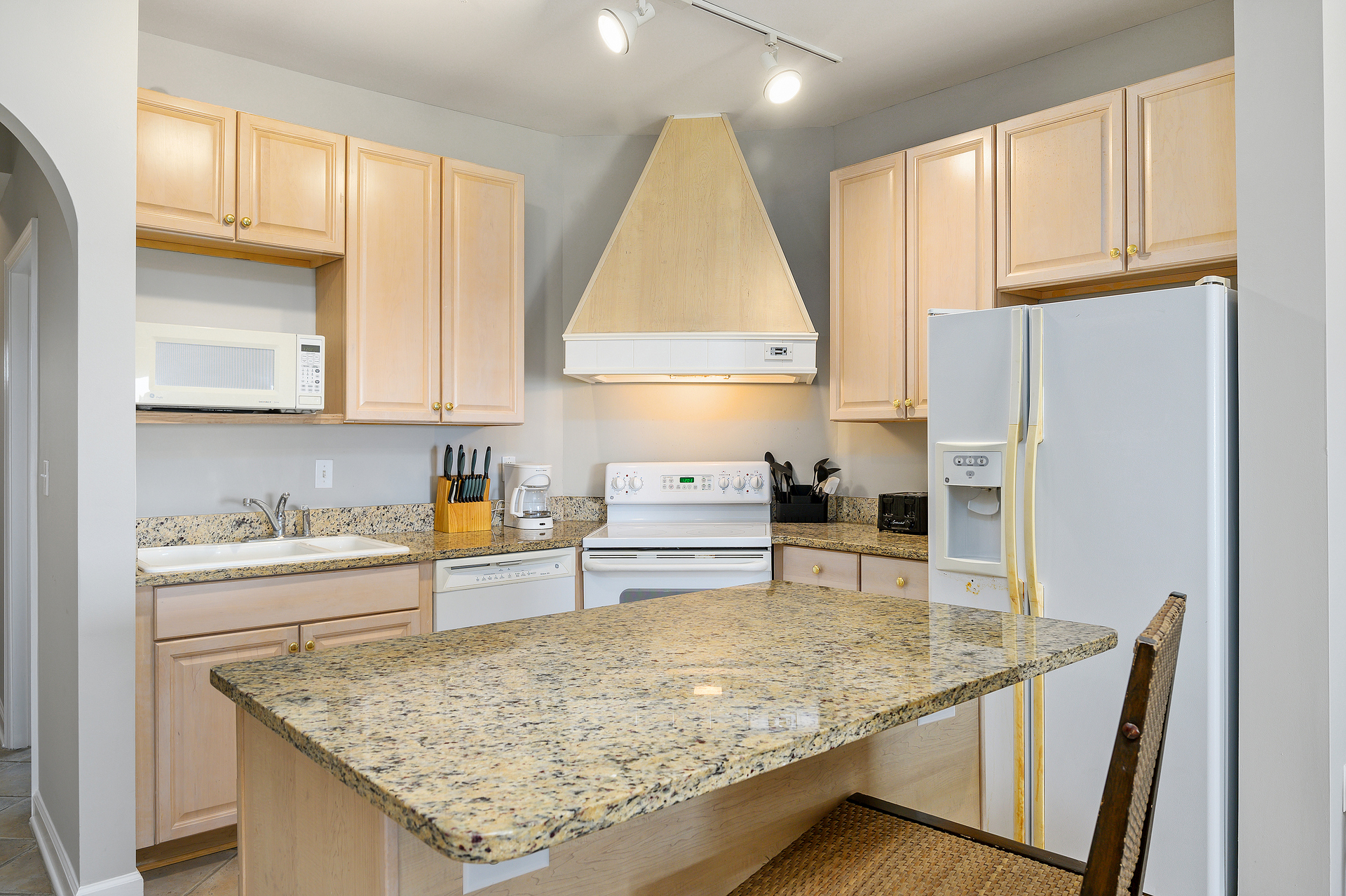 This kitchen even has a large island providing plenty of extra counter space