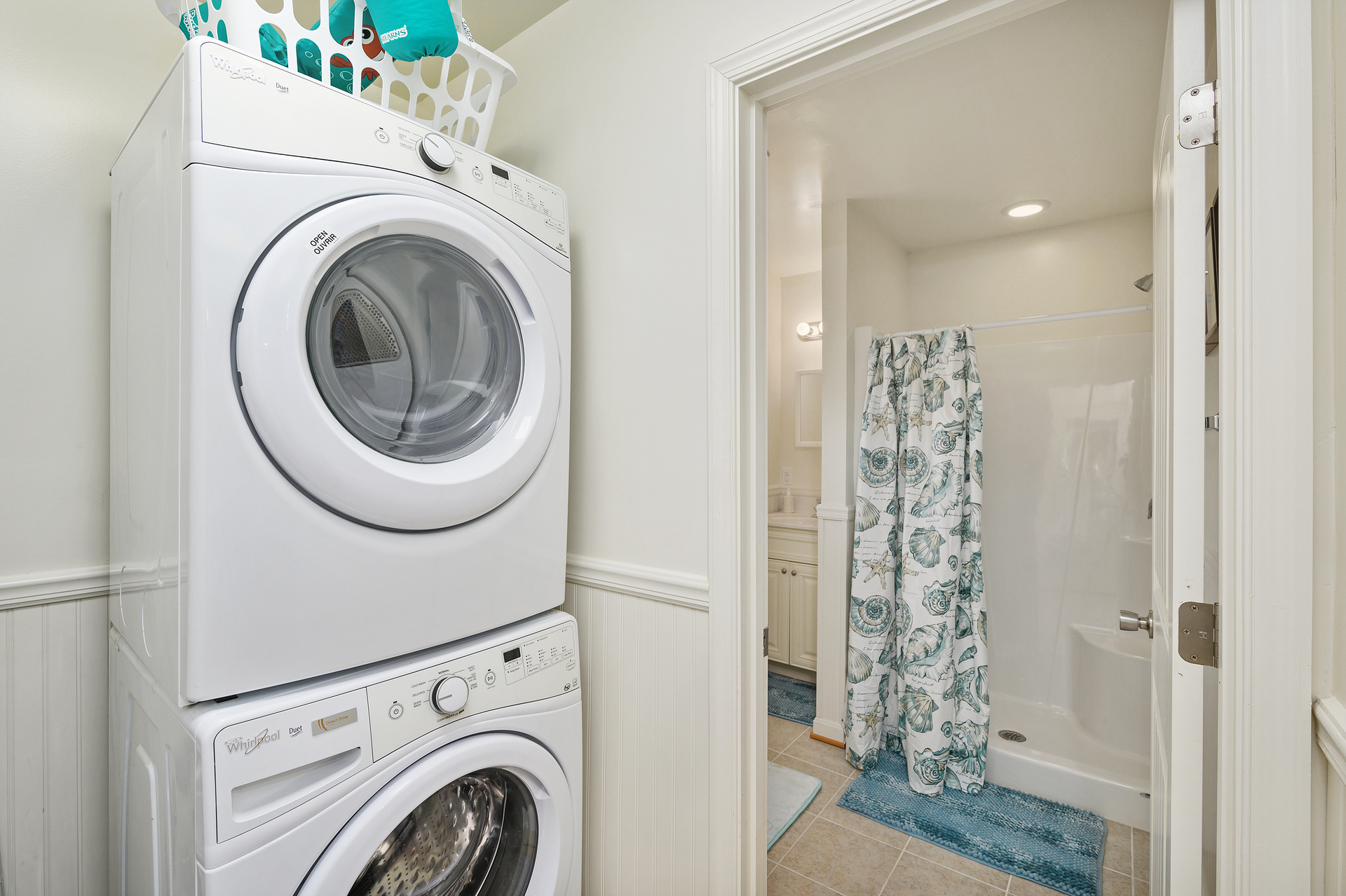 Just off Kitchen is the Laundry Area and a Full Bath with Walk-in Shower.