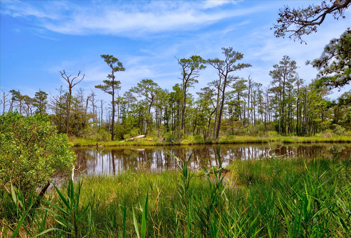 Over 3 acres of beautiful Bayfront with a Tidal Pool