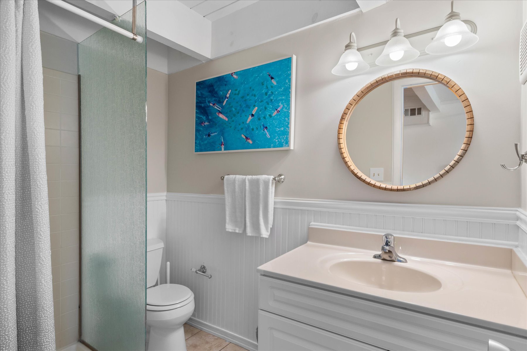 Full Bath on the main level has a Walk-in Shower