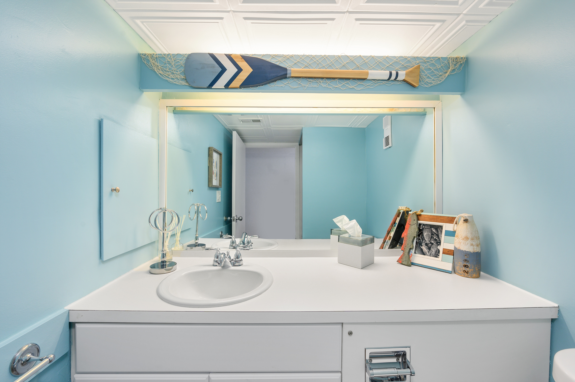 The Half bath is located in the Hall.