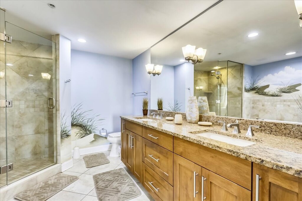 The Primary Bath features a double vanity, walk in shower and large soaking tub.