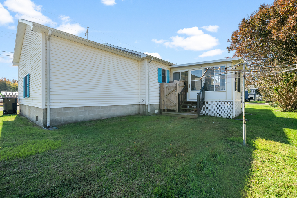 Around back, you'll find a refreshing Outdoor Shower.