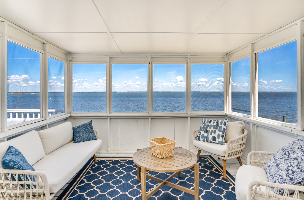 Just off the Living Area is a Waterfront Screened Porch you'll never want to leave.