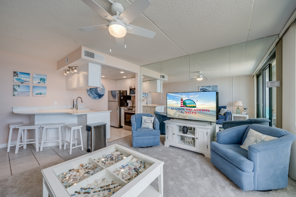 The open-concept living area keeps everyone connected from the kitchen to the couch.