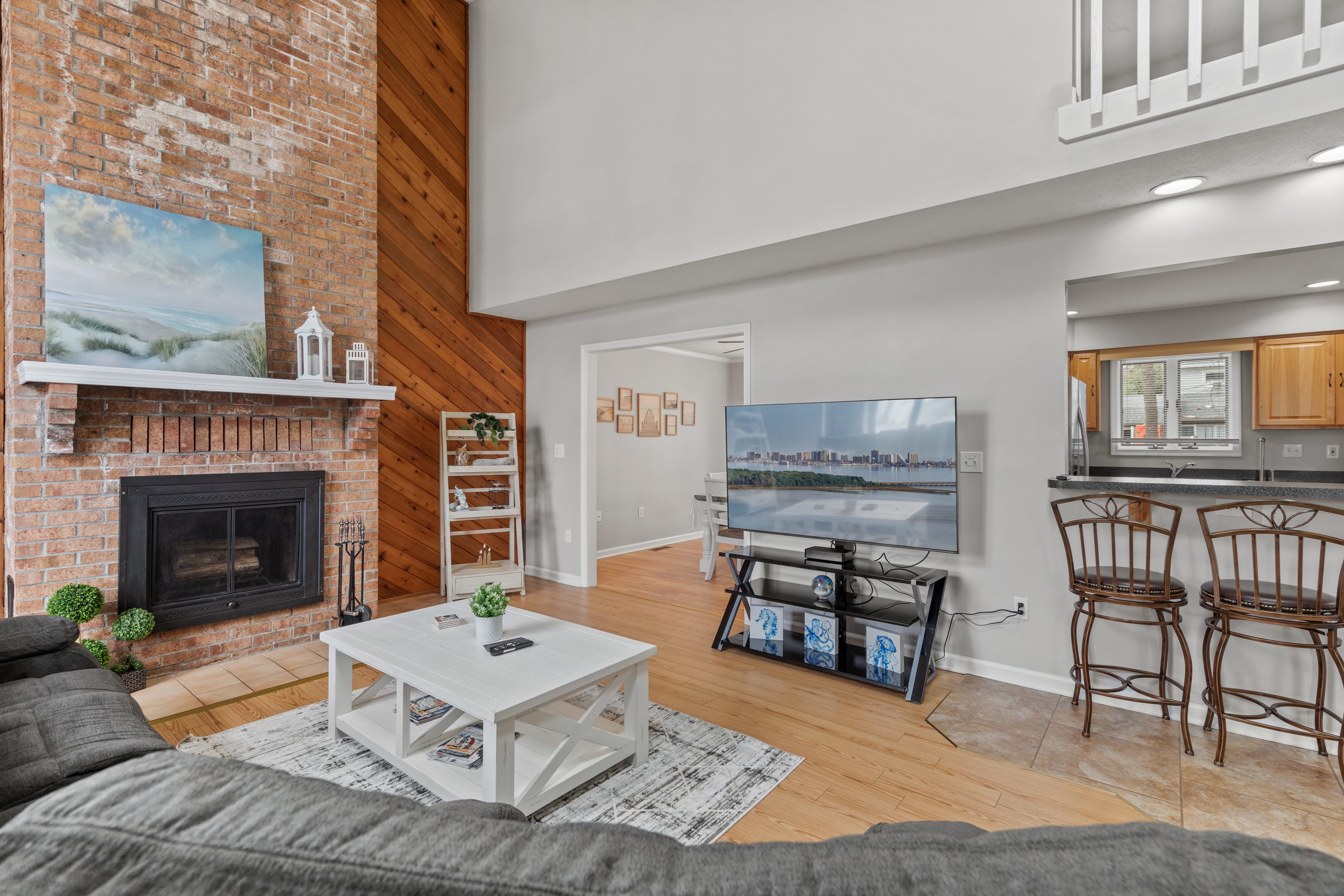 The Flat Screen TV makes for the perfect cozy night in. * Fireplace is Decorative ONLY*