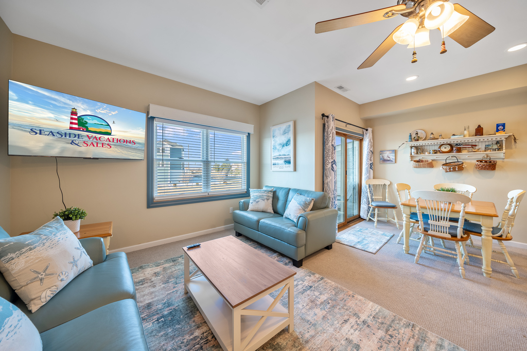 Kick back in the Living Area with Flat Screen Smart TV and Free WiFi after a fun-filled day at the Beach.