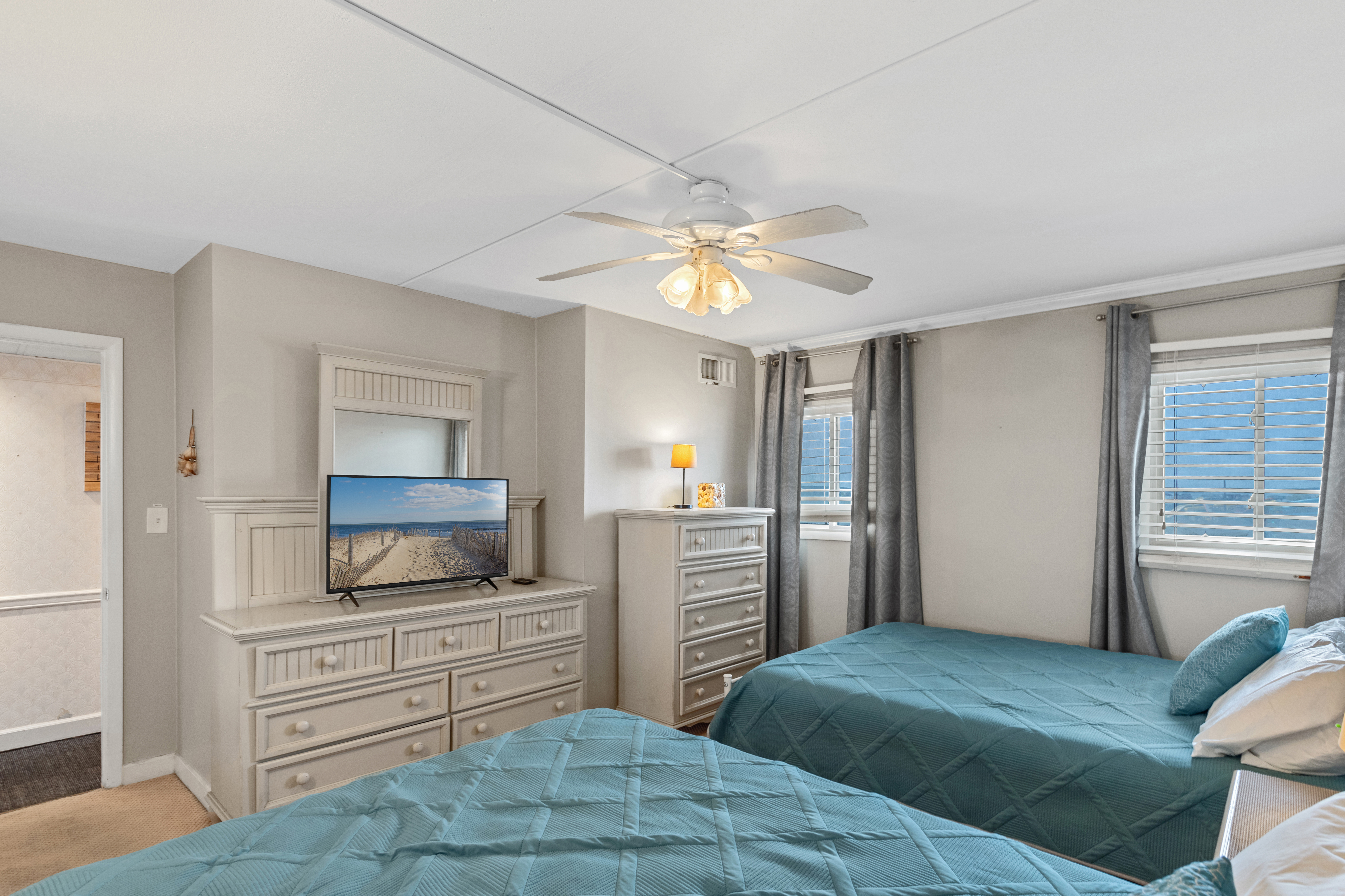 Sink into bed and catch up on your favorite shows on the Flat Screen TV!