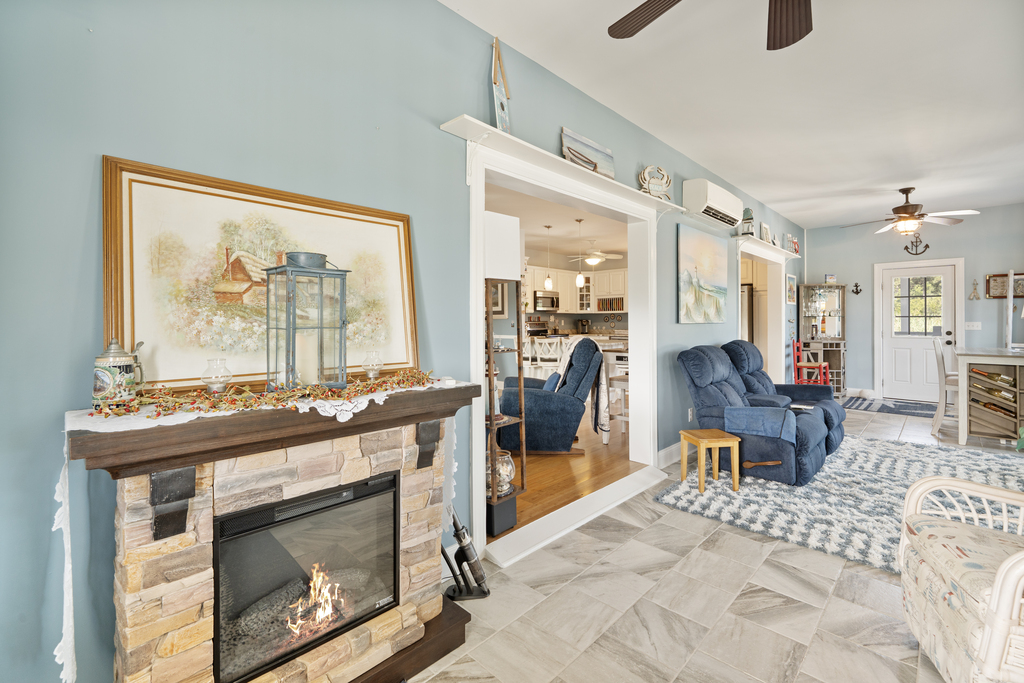 Relax in the cozy Sunroom and take in Views of the Pond.