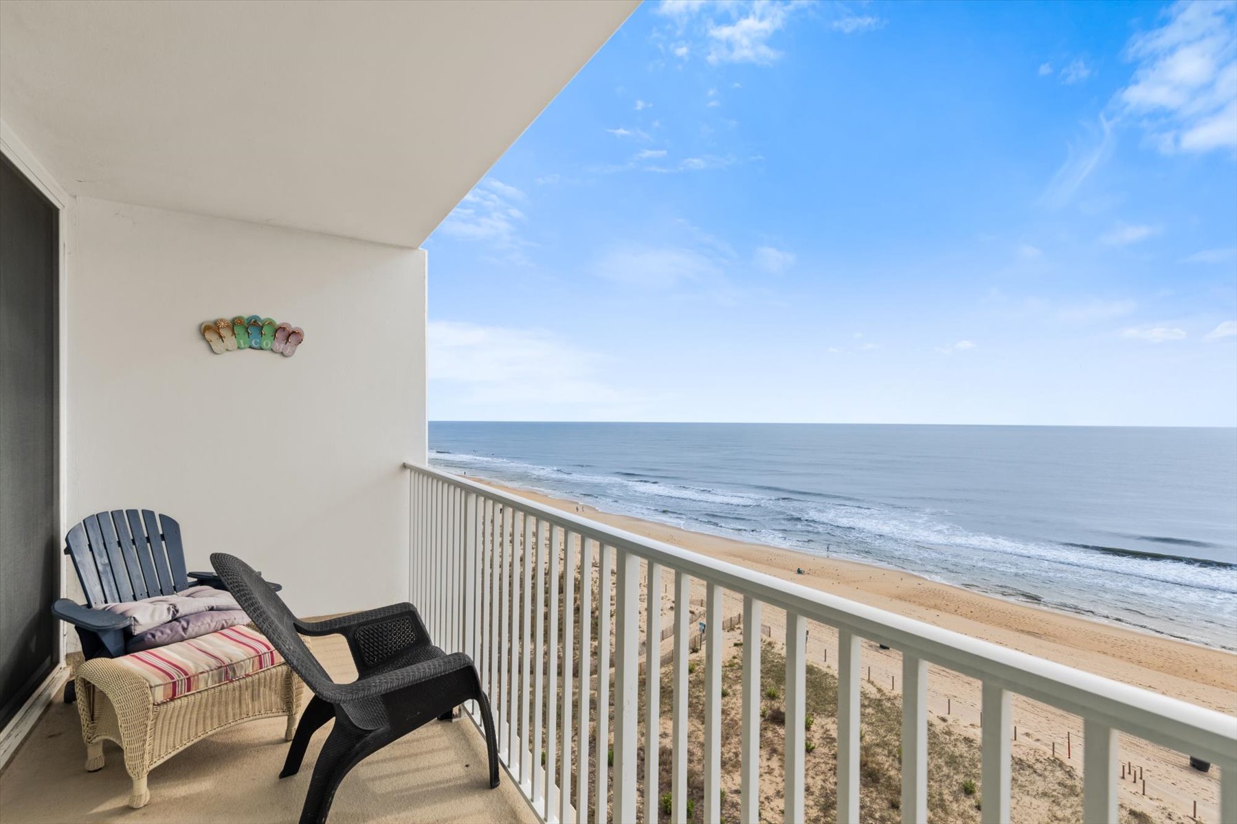 Watch the Dolphin in the surf while you enjoy your morning coffee