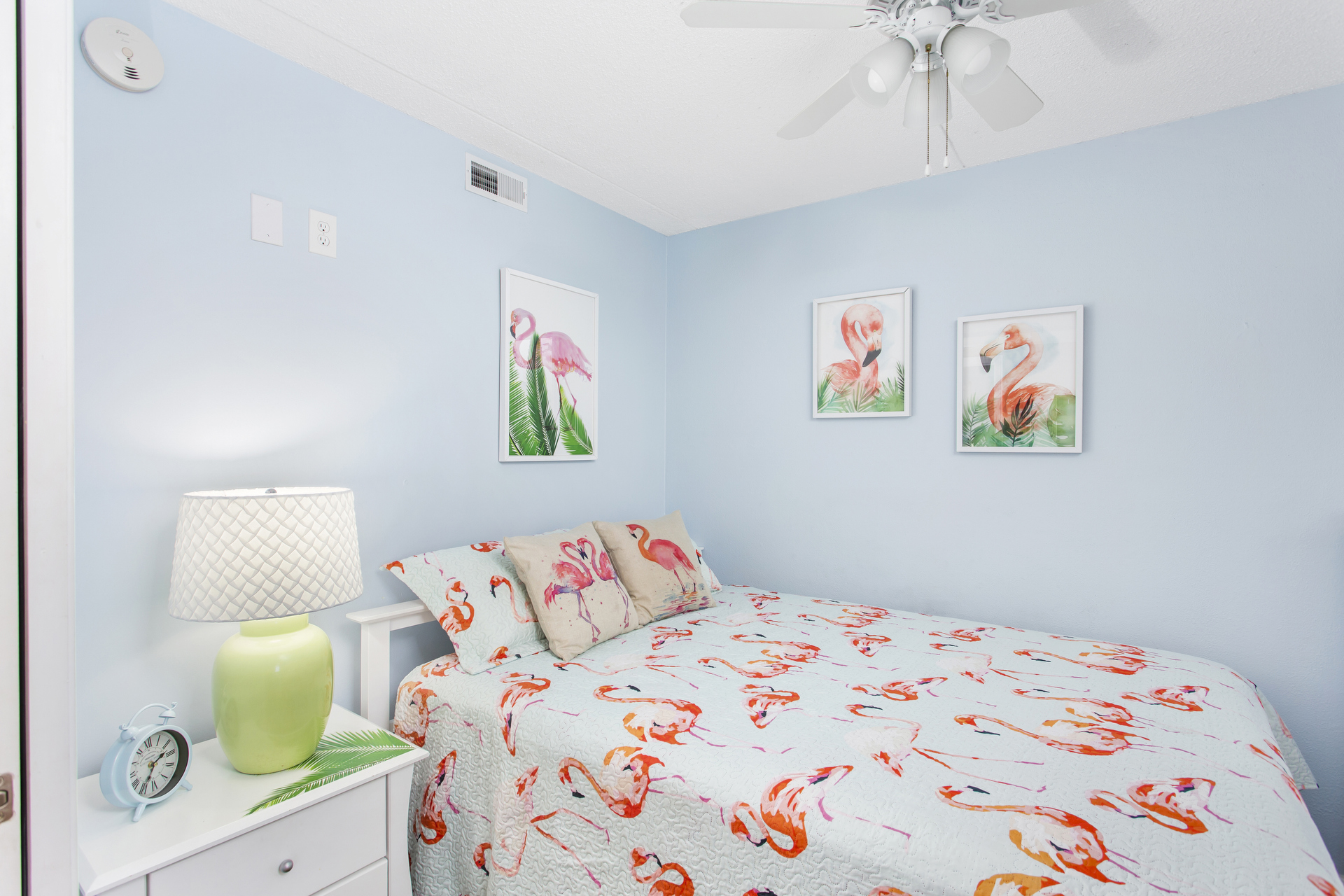 Bedroom 2 is Bright & Cheerful with a Plush Queen Bed.