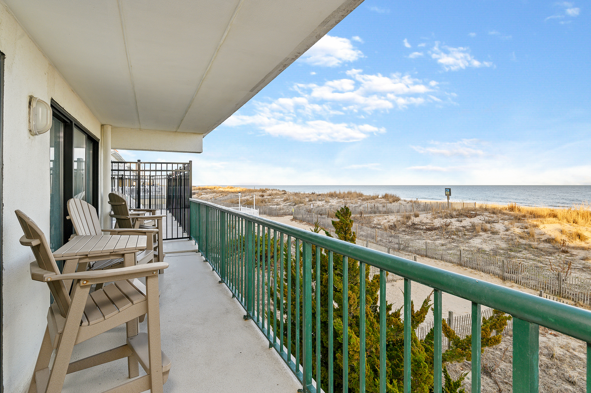 Enjoy long sweeping views of the ocean from the Privat Balcony, accessible through Bedroom 1 or the Living Space