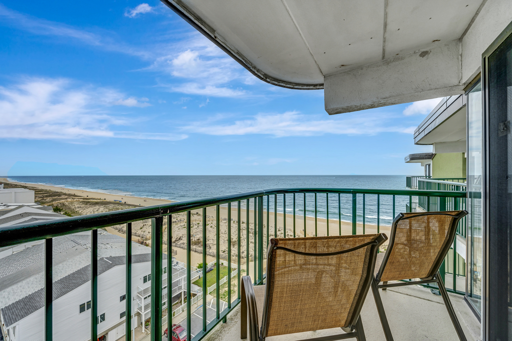 Take in all the beauty of the ocean views right outside your living room sliding door