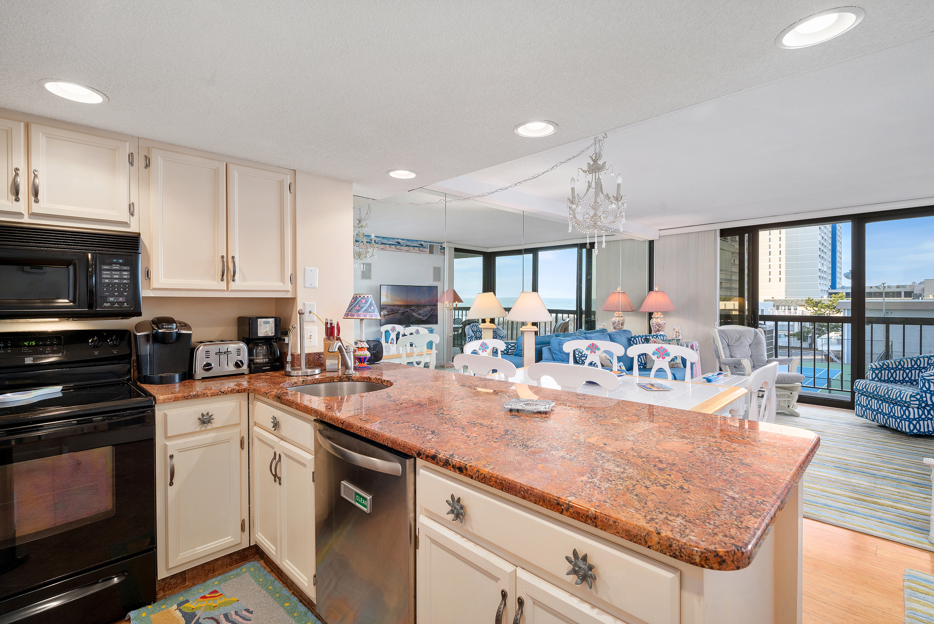 The Chef in your Family will never miss out on the Fun while Preparing Meals in this Open Kitchen!