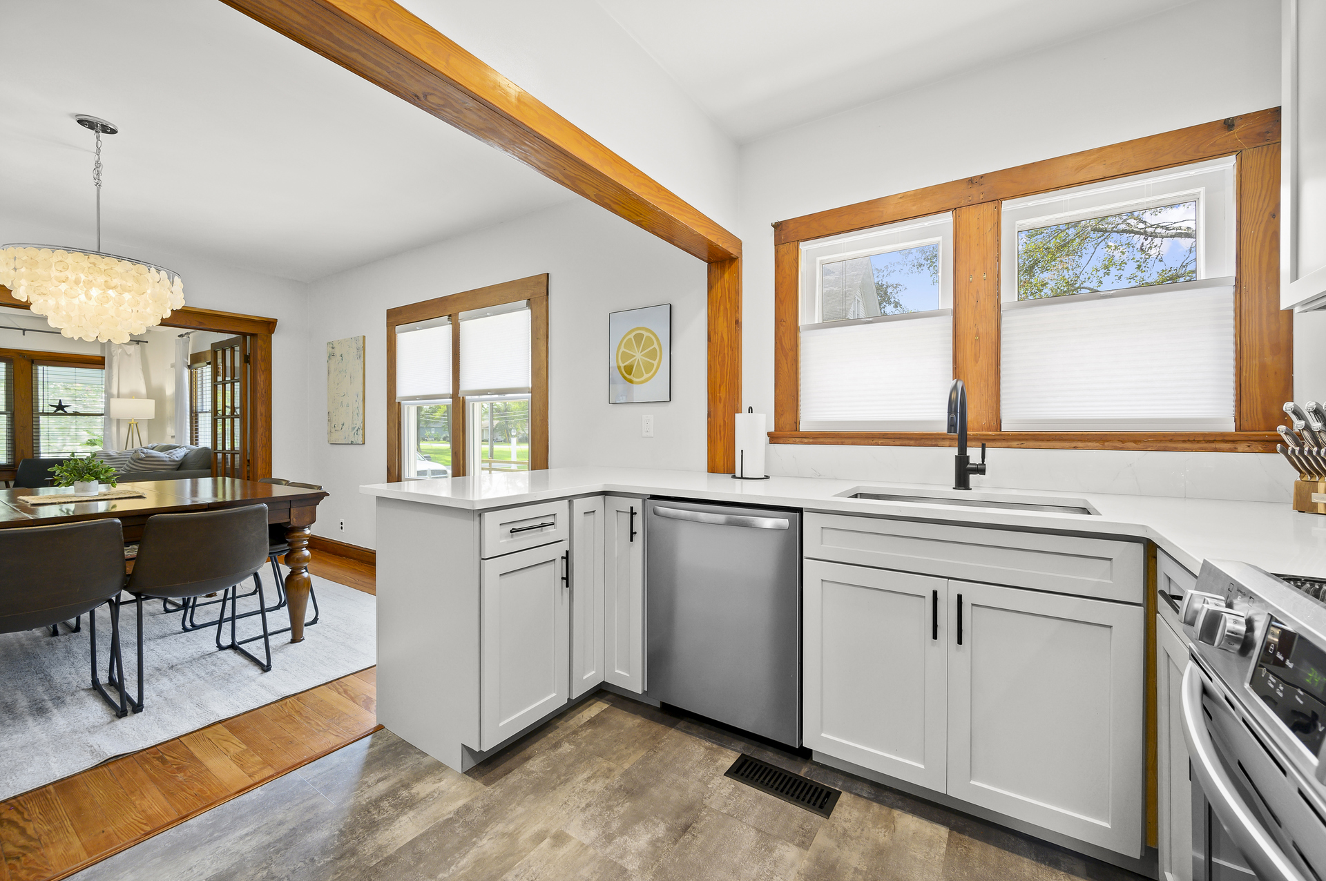 Gleaming Granite and Stainless Appliances.