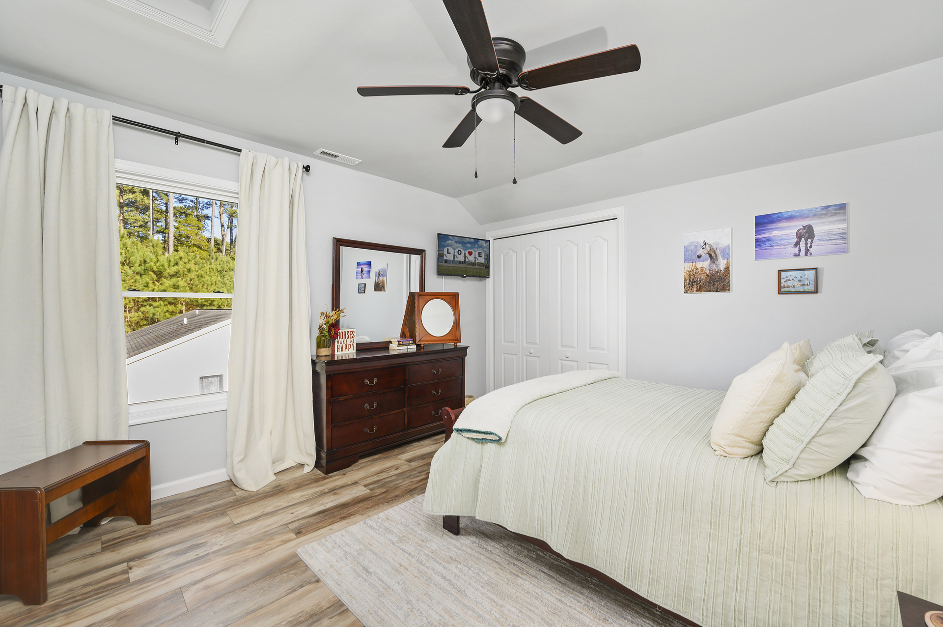 Bedroom 2 is decorated with lovely muted colors and has Flat Screen Streaming TV.