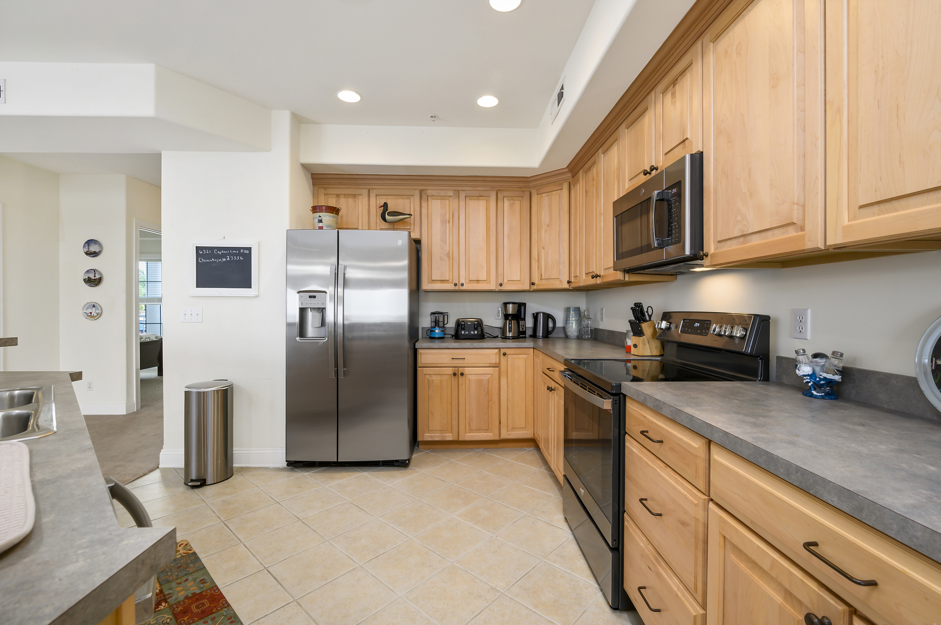 Stainless Appliances and Tile Flooring.