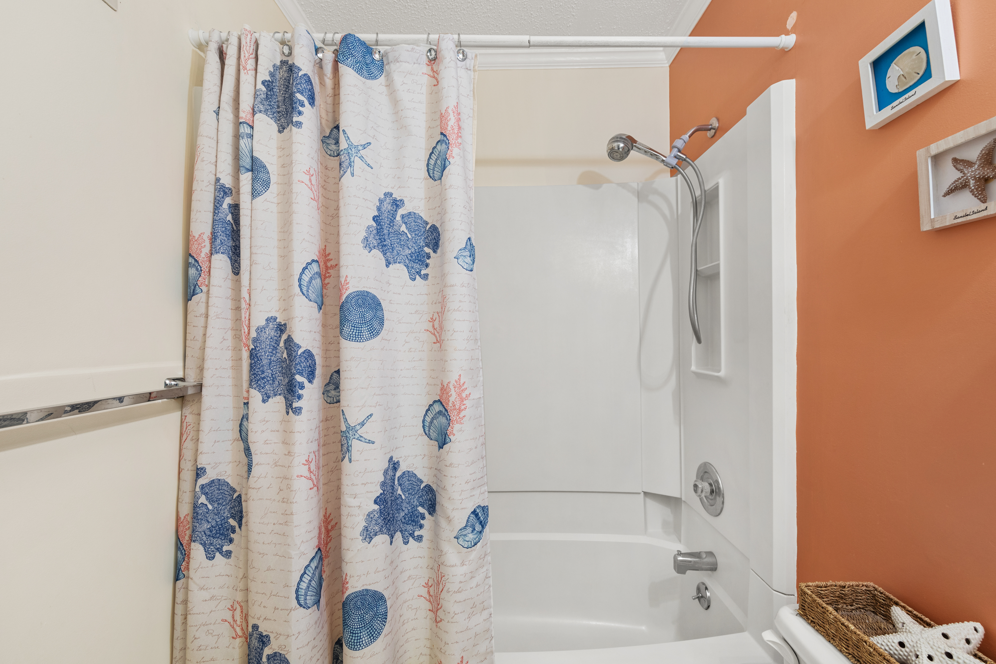 The Attached Bath has a Shower/Tub Combo!