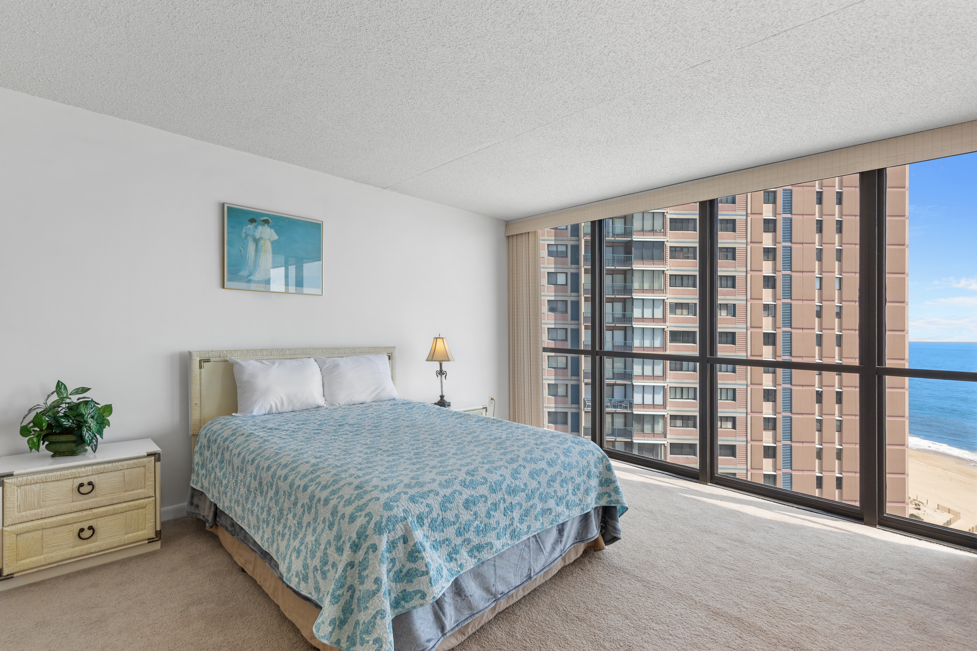 The Primary Bedroom is wonderful place to retreat after a fun filled day on the beach.