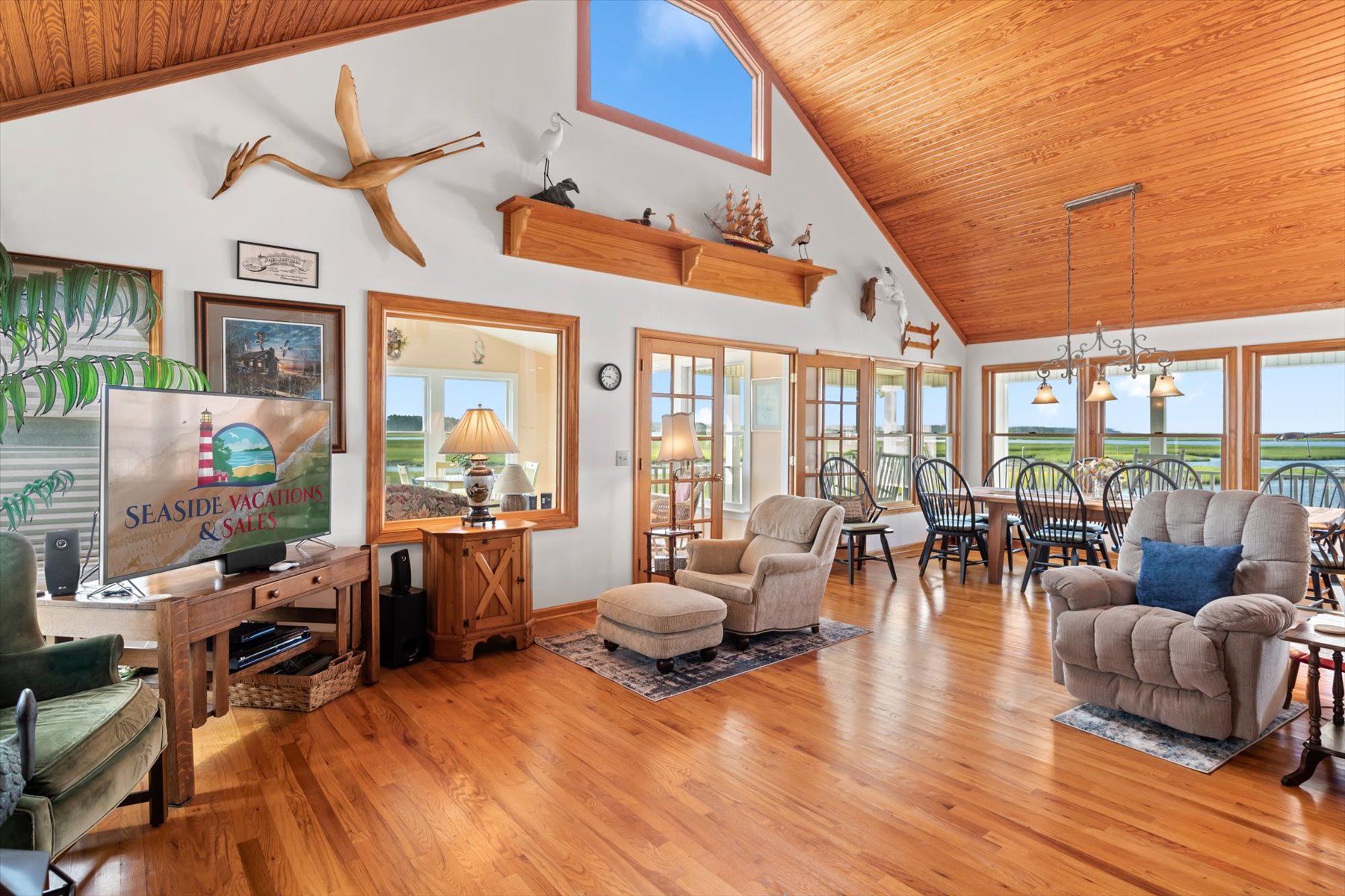 Soaring Ceilings and Warm Wood make this Custom Home absolutely stunning.