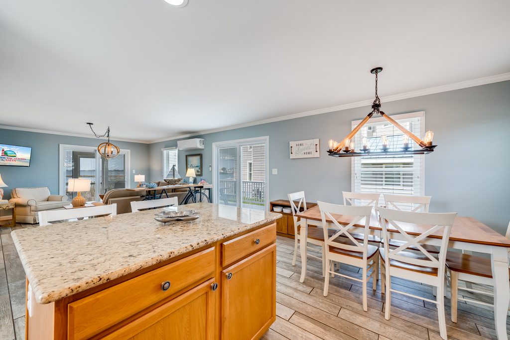 Gleaming granite countertops and all of the luxuries of this home are a chef's dream!